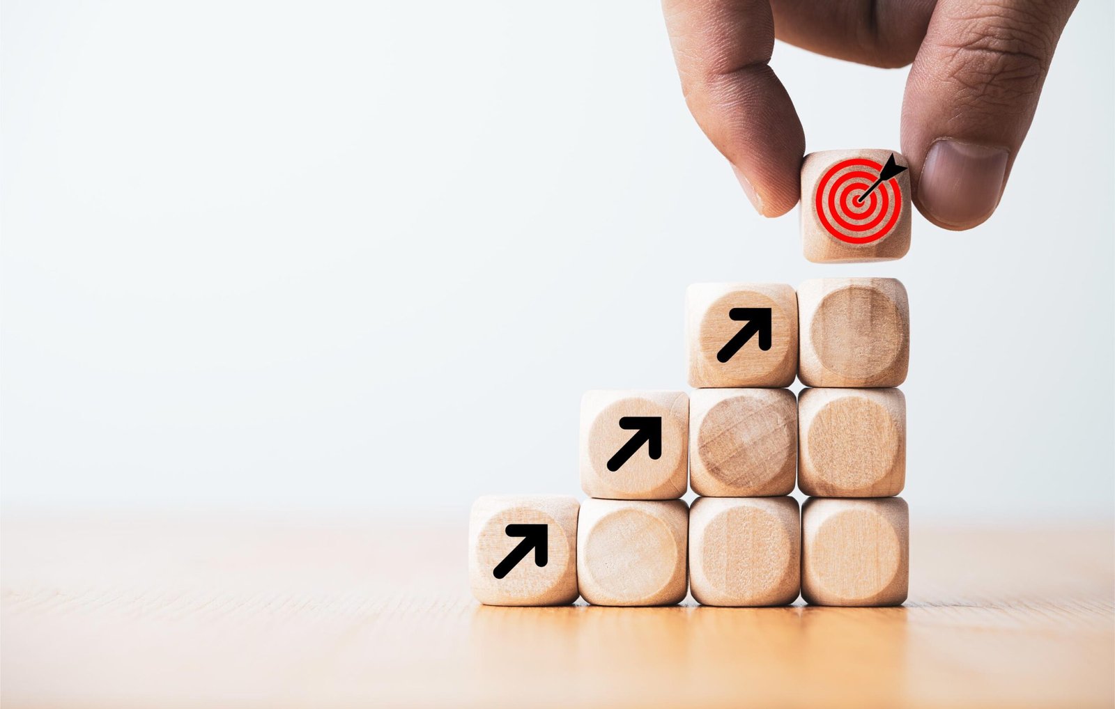 hand-putting-virtual-target-board-arrow-which-print-screen-wooden-cube-business-achievement-goal-objective-target-concept